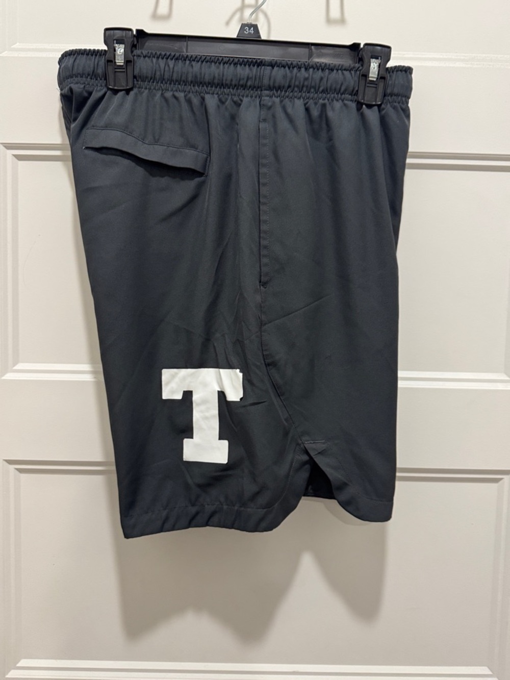 Nike Men's Black Athletic Shorts with White 'T' Detail